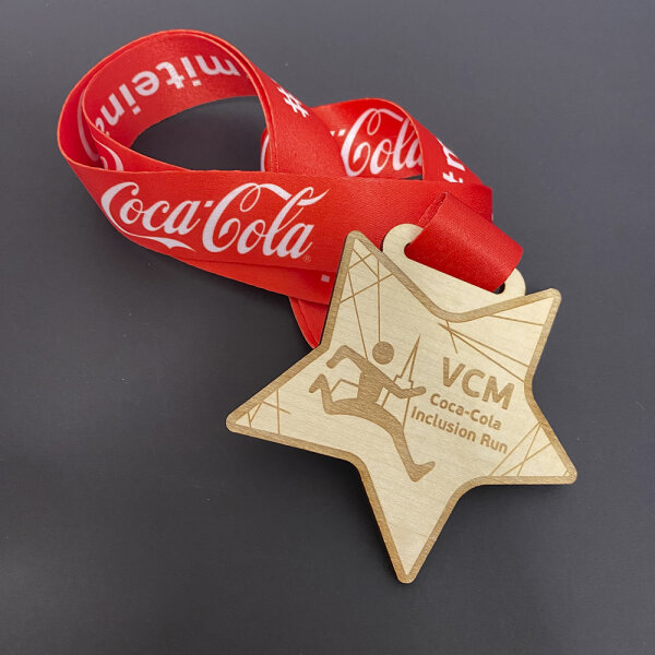 Kunden-Referenz: Holzmedaille "VCM Coca-Cola Inclusion Run"